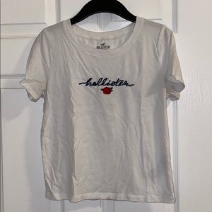 Hollister logo crop top with rose.